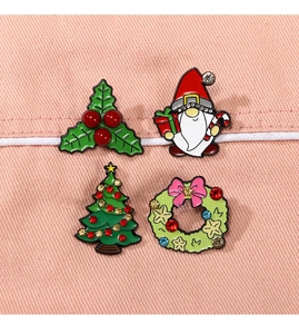 Set of four colorful Christmas enamel pins with holiday tree and Santa gnome details