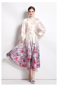 Detailed close-up of a satin floral dress featuring a mandarin collar and lantern sleeves