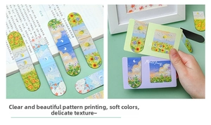 Detailed view of impressionist oil painting magnetic bookmarks on a book page