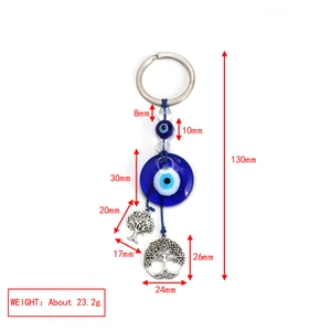 Detailed dimensions of evil eye and tree of life keychain with size measurements