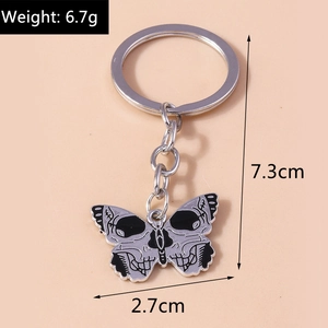 Detail view of a gothic butterfly keychain with dimensions 7.3cm and 6.7g weight