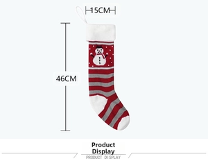 Detail view of 46cm red and white striped knit Christmas stocking with snowman pattern