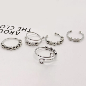 Adjustable stainless steel anxiety rings with rotating silver beads in various styles
