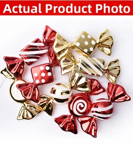 Detailed view of red and gold plated candy ornaments with various patterns for Christmas decor