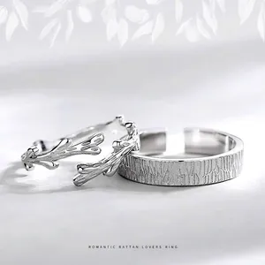 Romantic vine style silver couple rings set with tree bark texture and branch design