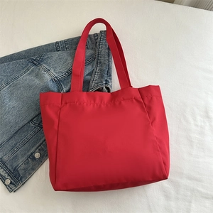 Large red Oxford tote bag with casual shoulder strap and top handle for women