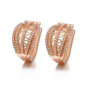 Macro view of rose gold plated hoop earrings with micro-set cubic zirconia stones