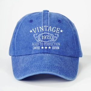 Vintage 1973 washed cotton baseball cap in navy blue with retro white printed lettering