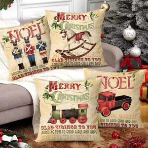 Set of four vintage Christmas pillow covers with nutcracker and red truck designs on sofa