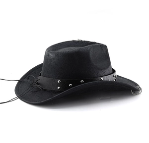 Detail of black cowboy hat with silver rivets on belt and decorative metal rings