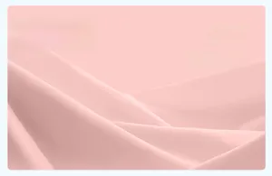 Primo piano del tessuto yoga rosa chiaro elastico con texture morbida e coste fini