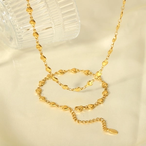 French style 18K gold plated stainless steel heart link necklace on satin background