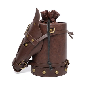 Detail of vintage brown PU leather bag with 3D horse head motif and golden rivets