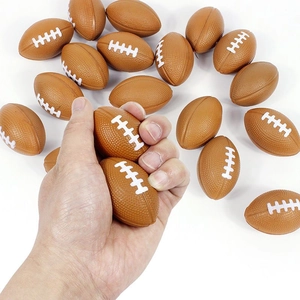 Detailed view of mini brown PU foam stress footballs showing soft texture and size
