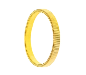 Detailed macro view of the golden elastic metal spring armband with fine ribbed texture