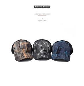 Detailed view of trucker hats with graffiti prints and breathable mesh panels