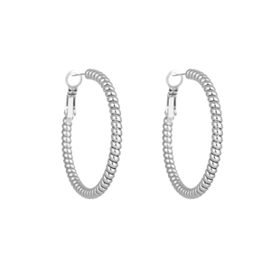 Macro detail of silver stainless steel spiral texture hoop earrings with pin closure