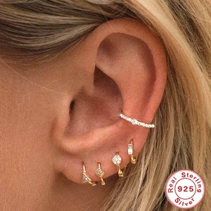 925 sterling silver gold hoop earrings with zircon charms on a female ear