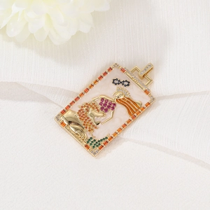 Close-up of golden tarot card pendant with lion pattern and colorful gemstone inlays