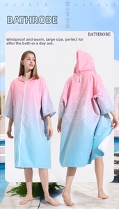 Detail of quick-dry hooded beach poncho with zipper and palm tree back print