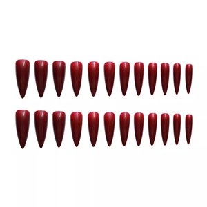 Glossy burgundy stiletto press-on nails set of 24 pieces on a clean white background