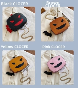 Detail of Halloween pumpkin crossbody bags with gold chain and bat charm in four colors