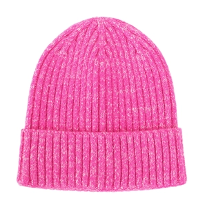 Close-up of rose red knitted baby beanie showing thick ribbed texture and folded brim