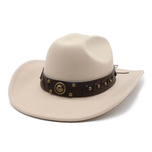 Detail of beige felt cowboy hat with leather band, gold rivets, and horseshoe buckle