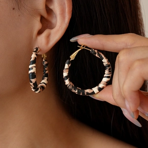 Vintage leopard print hoop earrings with golden hooks for a bold minimalist style