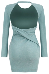 Close-up of mint blue glitter dress featuring an open back and crisscross waist detail