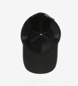 Internal structure of the winter baseball cap showing seam tape and adjustable metal buckle