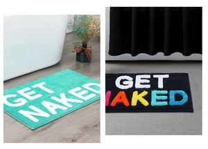 Detail showing two plush absorbent bathroom mats with GET NAKED lettering in teal and black