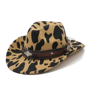 Cow print felt cowboy hat with rolled brim and leather band with silver buckles