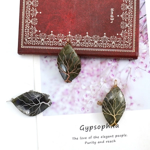 Tree of Life Labradorite leaf pendant necklace in gold, silver, and copper wire wrap