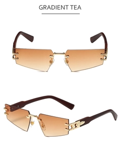 Détail de lunettes de soleil géométriques sans monture, verres dégradés et branches en bois