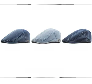 Detailed view of three-color washed denim beret hats with adjustable metal side buckles