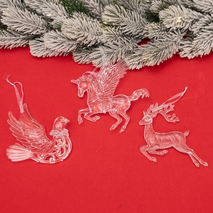 Set of 3 clear acrylic Christmas ornaments featuring reindeer, pegasus, and bird shapes