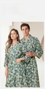 Close-up of tropical palm leaf print on quick-dry absorbent bathrobe for men and women