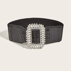 Women's black elastic wide belt featuring a large rhinestone buckle and croc-embossed leather