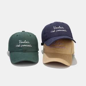 Casual baseball caps with French embroidery in green, navy, and beige cotton fabric