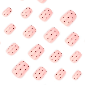 Short square pink press-on nails with dark red polka dots and a glossy finish