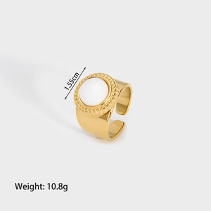 Detail of 18K gold stainless steel ring with white stone, showing 1.55cm size and 10.8g weight