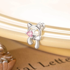 Silver kitten stud earring with pink heart gemstone and bow detail for girls