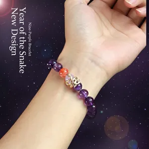 Purple amethyst beaded bracelet with gold snake charm and red accent bead for women