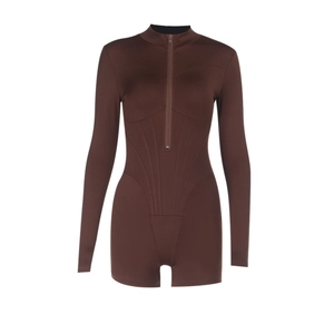 Detailed view of dark brown jumpsuit featuring front zipper and sculpting seam lines