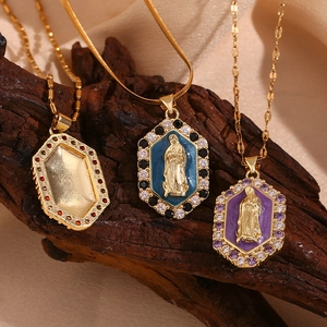 Detailed close-up of 18K gold plated Virgin Mary hexagon pendants with enamel and zircon