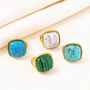 Set of 4 gold stainless steel open rings featuring colorful square faux stone inlays