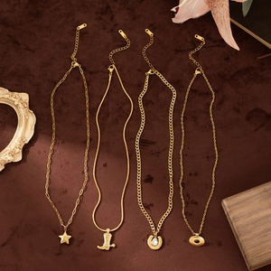 Set di collane retrò in acciaio inossidabile placcato oro 18K con ciondoli a stella