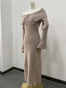 Detail of the knit ribbed texture and off-shoulder lapel on this elegant pink dress