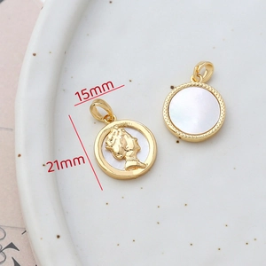 Macro view of 14k gold-filled round shell pendant with portrait relief, 15mm diameter